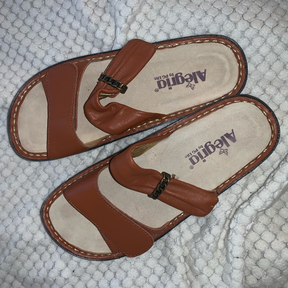 Two strap brown leather Alegria sandals